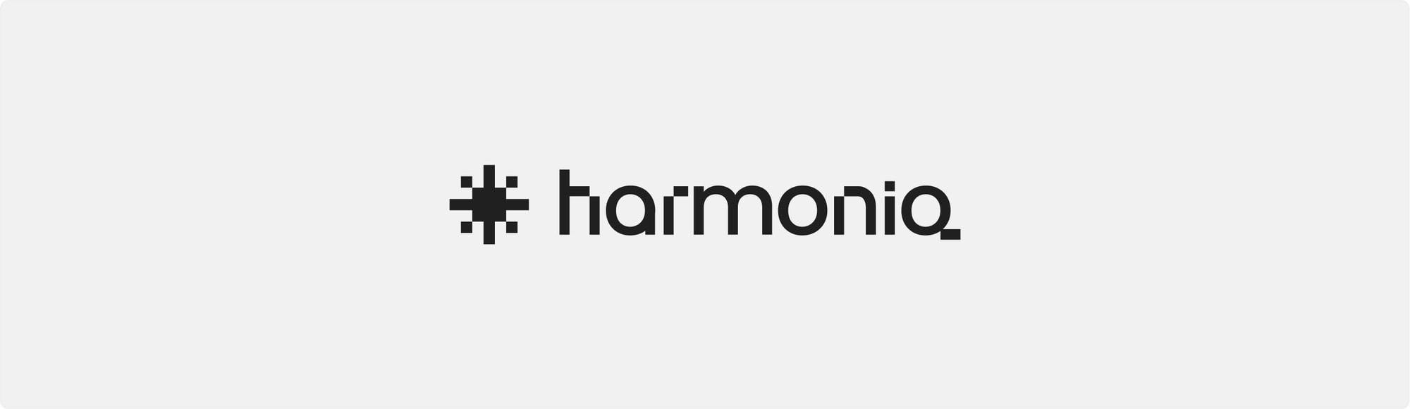 The harmoniq wordmark and its pixel mark, black on grey.